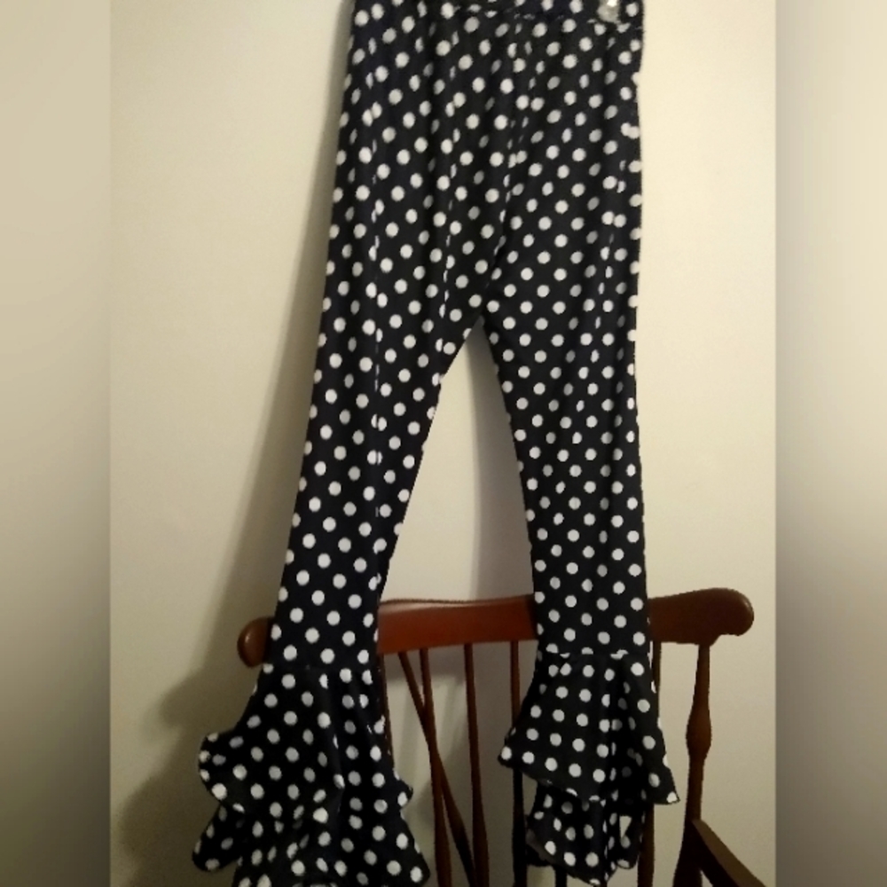 Black and white polka dot stretchy pants.